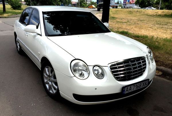 357 KIA Opirus белый j0w5