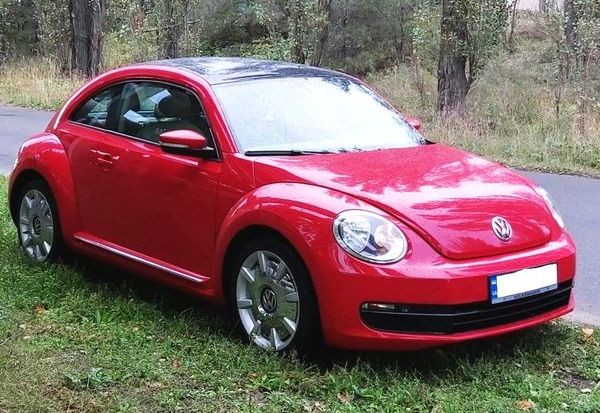 234 Volkswagen New Beetle красный 2KQe