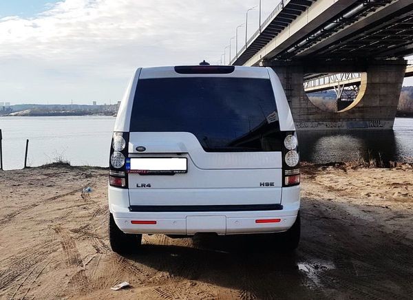 394 Land Rover Discovery 4 белый без водителя lzXe