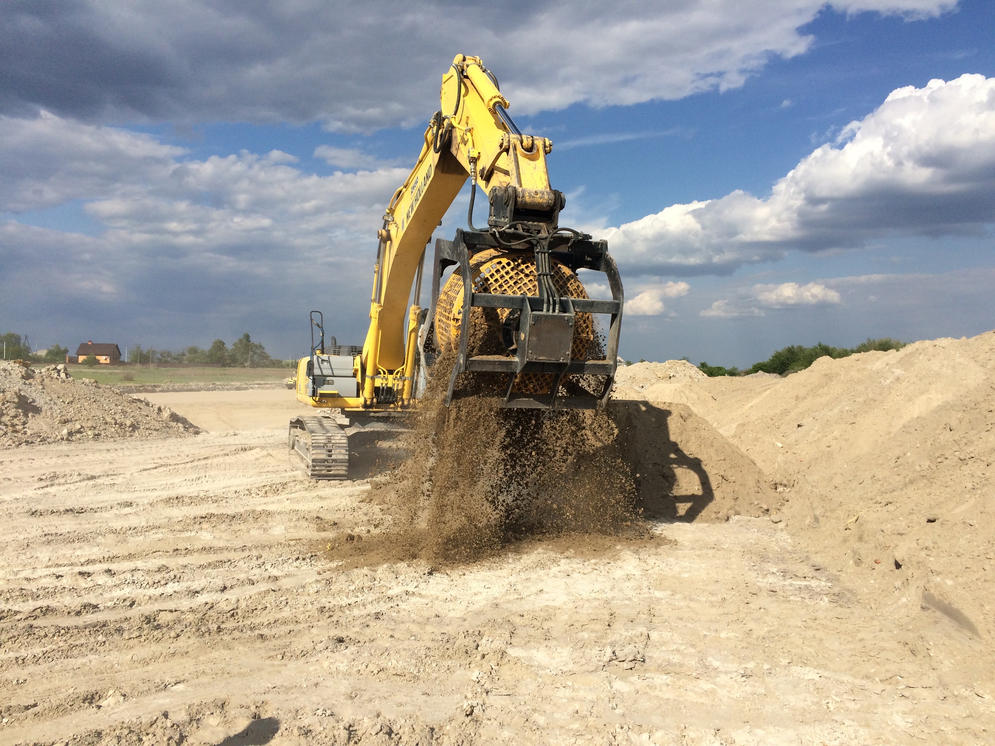 Экскаватора New Holland E385 B   вес 37,5 т ковш 2м.куб QLBg