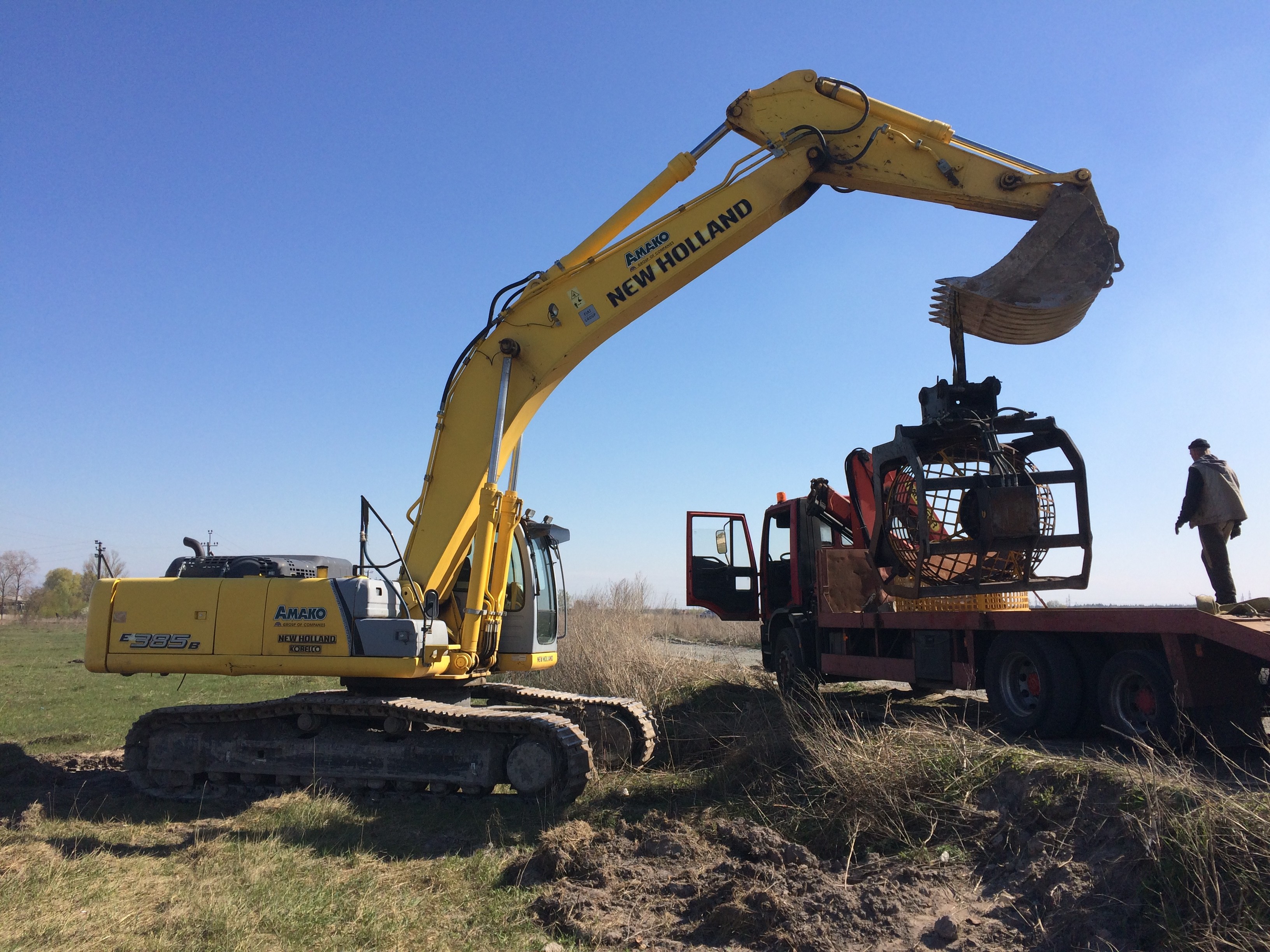 Экскаватора New Holland E385 B   вес 37,5 т ковш 2м.куб QLBg