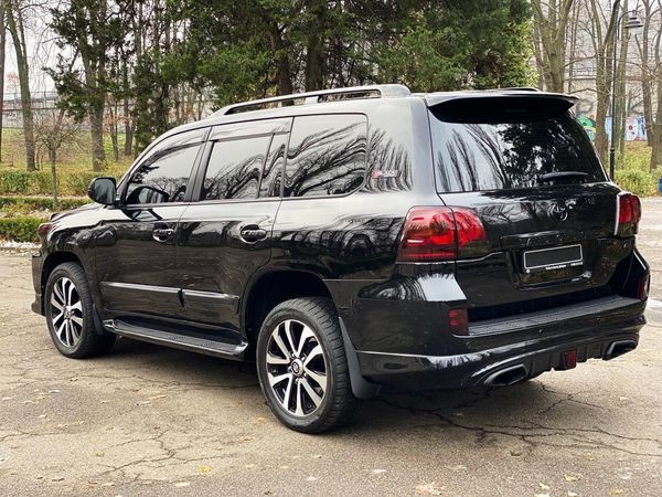 161 Toyota Land Cruiser 200 черный джип 2008 с водителем lzP1