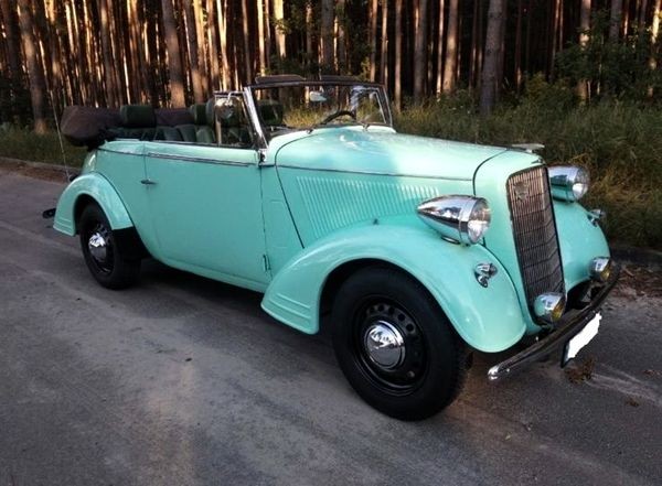 137 Кабриолет ретро Opel бирюзовый с водителем для фото свадьбы PmAp