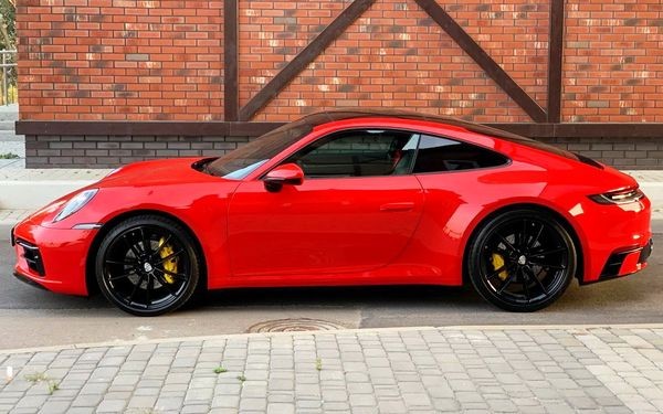 091 Арендовать Porsche 911 Carrera S красный без водителя на свадьбу PmXn