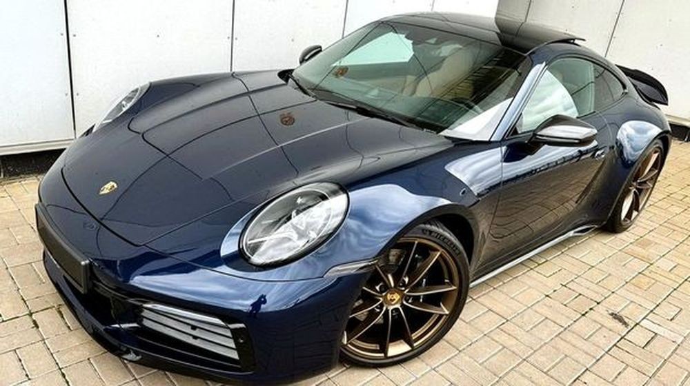 263 Porsche 911 Carrera S темно синий без водителя RVNm